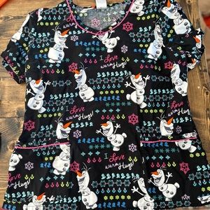 Scrub top size L, fits like a medium